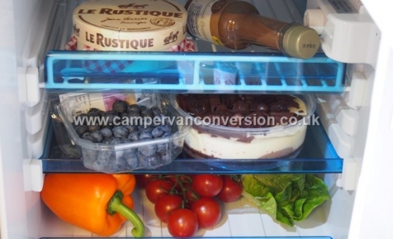 A well filled campervan fridge